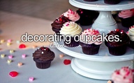 Decorating cupcakes.